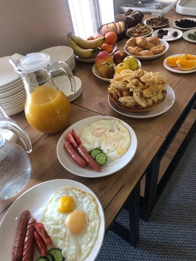 Ave Hotel Osh Bagian luar foto