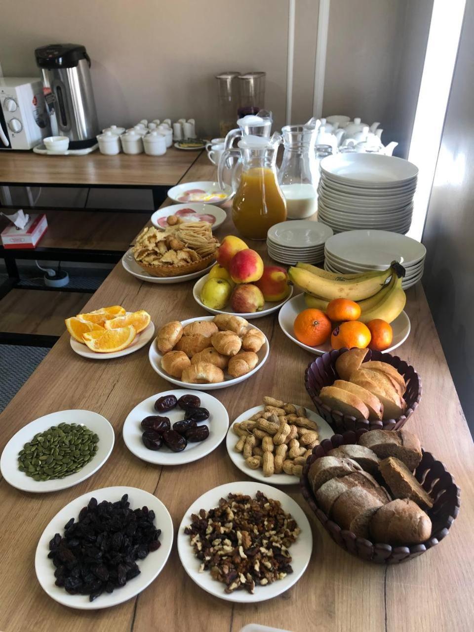 Ave Hotel Osh Bagian luar foto