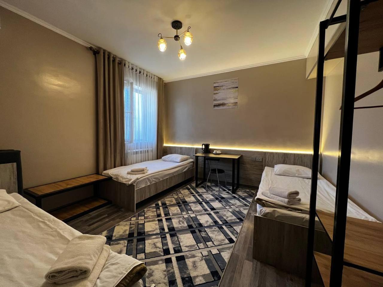 Ave Hotel Osh Bagian luar foto